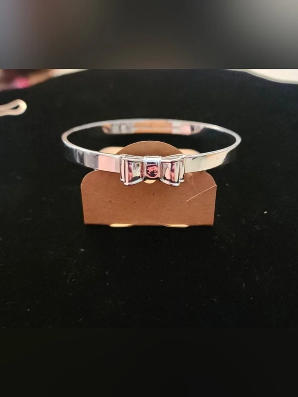 Kate Spade New York 'Take a Bow' Silver Tone Bangle Bracelet 2.5" - Picture 1 of 8